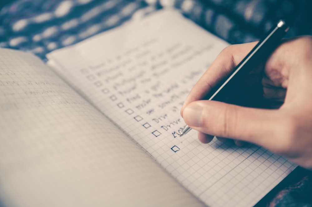 Cleaning business scheduling software on a tablet showing daily team assignments